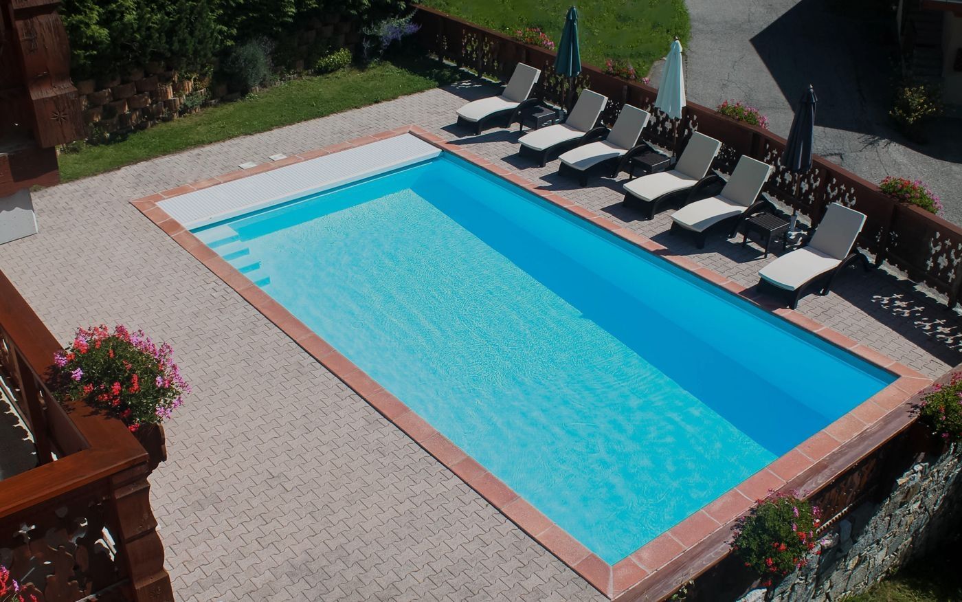 Heated outdoor swimming pool of the hotel