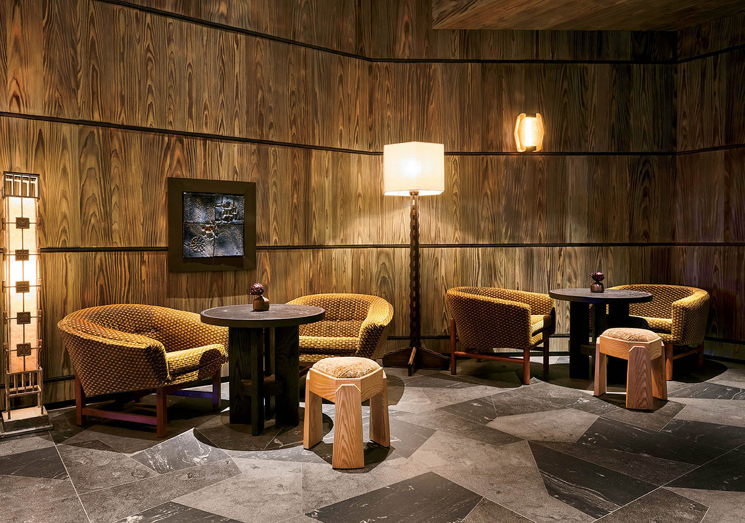 Warm wood lounge with set tables